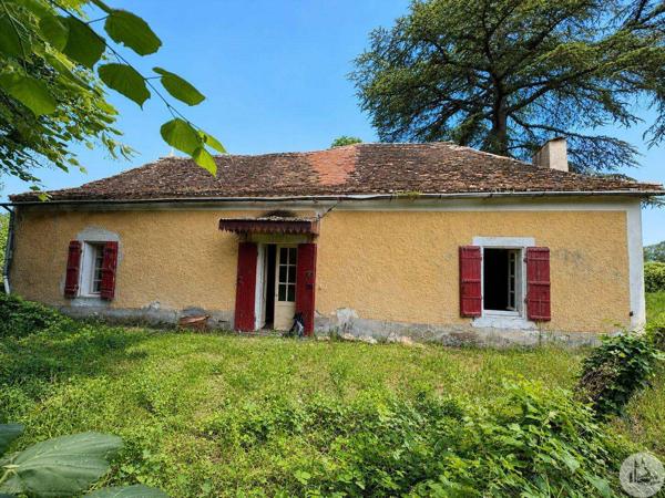 Maison à rénover avec dépendances.