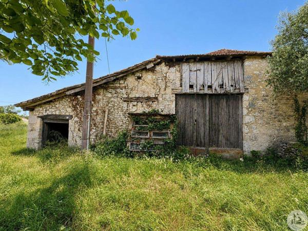 Maison à rénover avec dépendances.