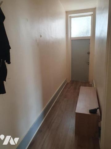 IMMEUBLE avec RDC COMMERCIAL LIBRE et 2 logements loués