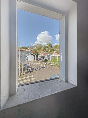 SAINT-PIERRE : Immeuble de 288m² Vue mer et montagne