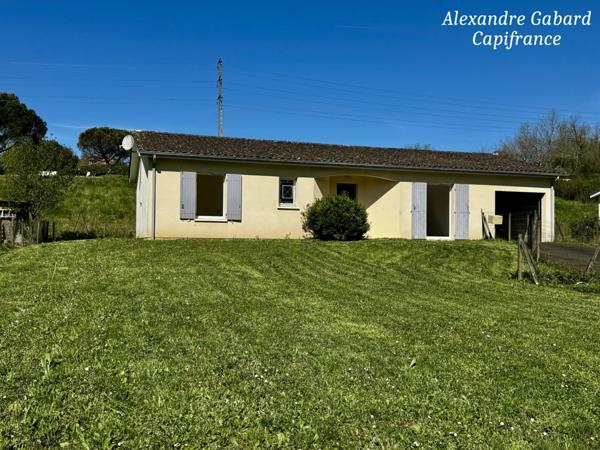 Maison de plain-pied - 3 chambres - Jardin - Garage