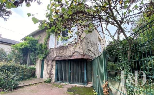 Maison lumineuse avec grand terrain arboré