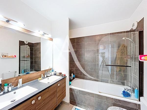 À VENDRE - MASSY ATLANTIS - APPARTEMENT 4 PIÈCES AVEC BALCON, DOUBLE PARKING ET À 10 MINUTES DE MASSY-PALAISEAU