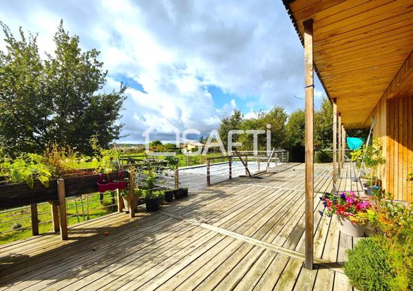 Maison en ossature bois de 214m² avec grand terrain boisé