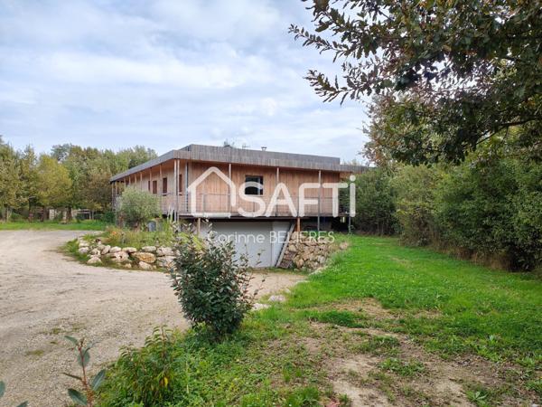 Maison en ossature bois de 214m² avec grand terrain boisé