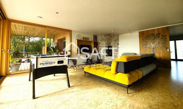 Maison en ossature bois de 214m² avec grand terrain boisé