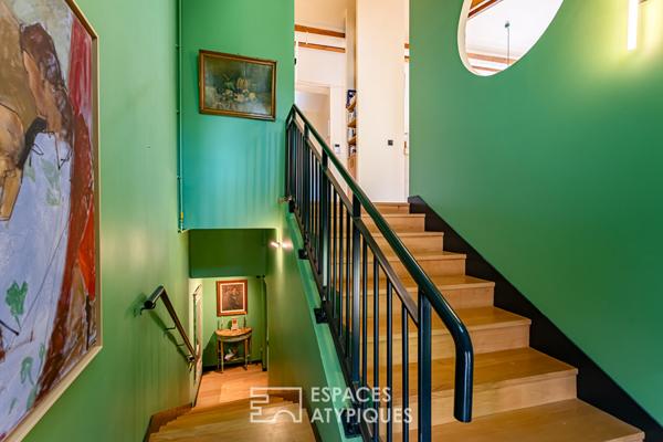 Lumineux duplex avec terrasse, dans sa demeure historique réhabilitée