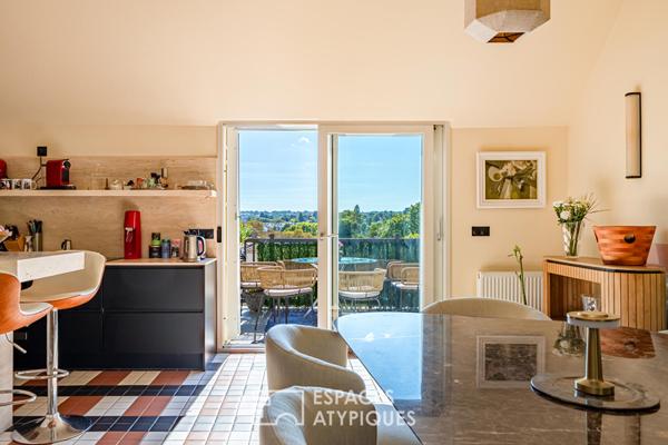 Lumineux duplex avec terrasse, dans sa demeure historique réhabilitée