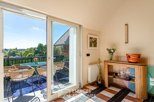 Lumineux duplex avec terrasse, dans sa demeure historique réhabilitée