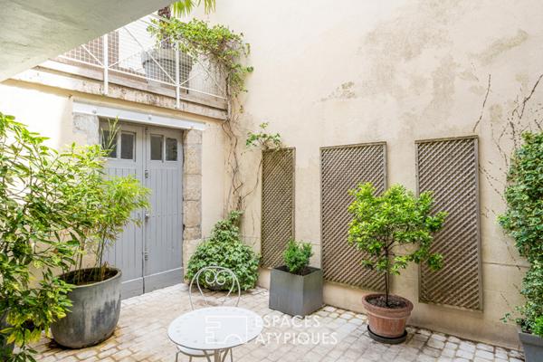 Demeure ancienne avec jardin clos en centre-ville