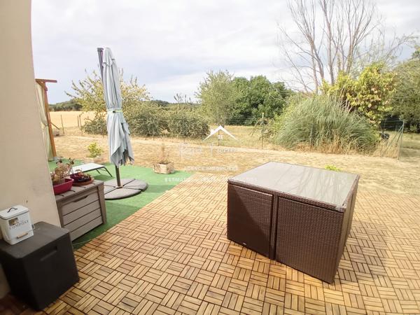 Vue sur la campagne, (zone non constructible), dans un hameau