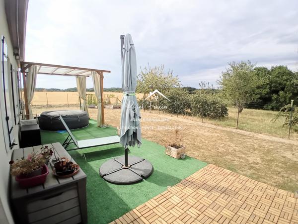 Vue sur la campagne, (zone non constructible), dans un hameau