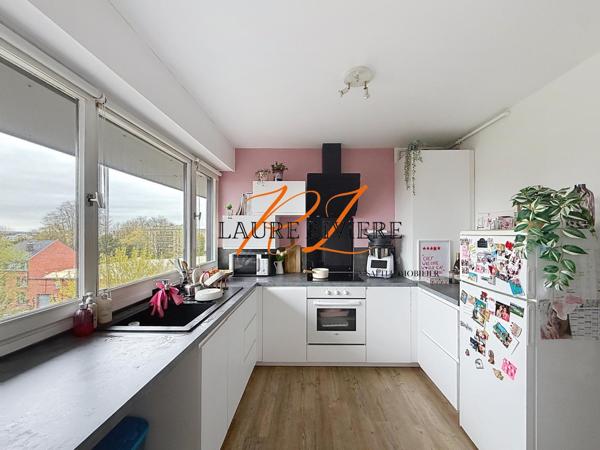 T2 lumineux 48 m² – Dernier étage avec ascenseur – Vue parc – parking