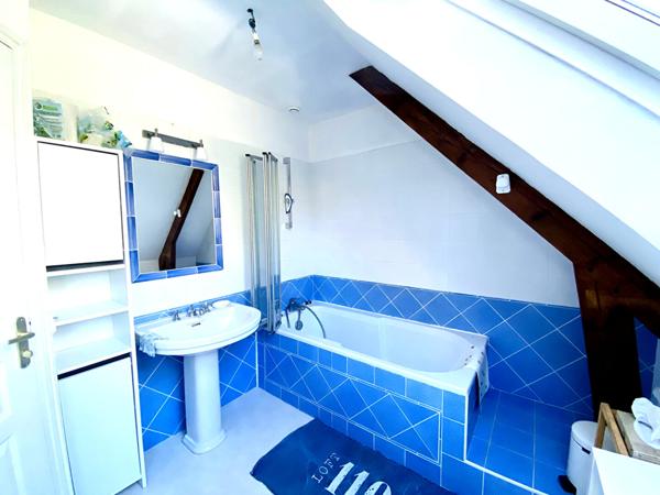 Maison spacieuse au coeur d'un écrin de verdure