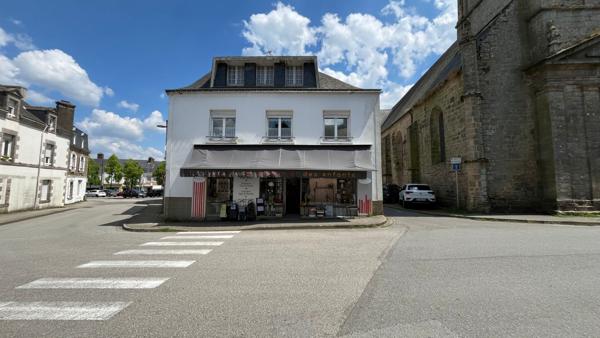 Centre-ville : appartement de 110 m² avec 4 chambres et local commercial loué