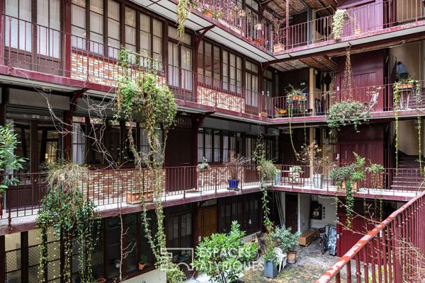 Ancien atelier au coeur d’une cour Eiffel