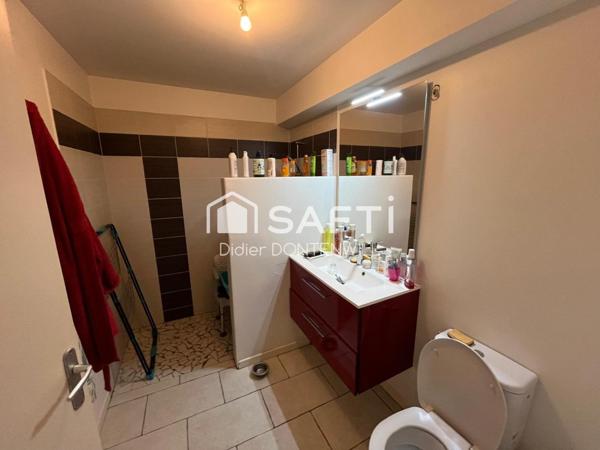 T2 au rez de chaussée d'un immeuble bien situé 38460 CREMIEU