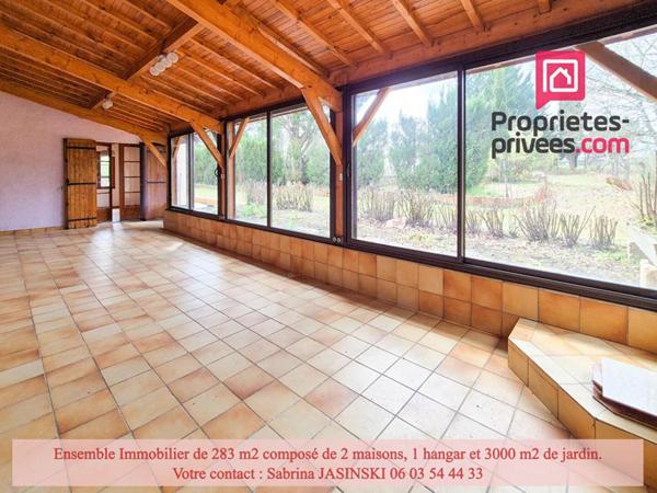 Ensemble immobilier, deux maisons, double garage et grand jardin