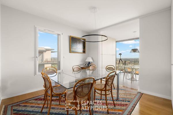 Toit-terrasse avec grandes terrasses et vue imprenable sur Lyon dans une résidence de standing