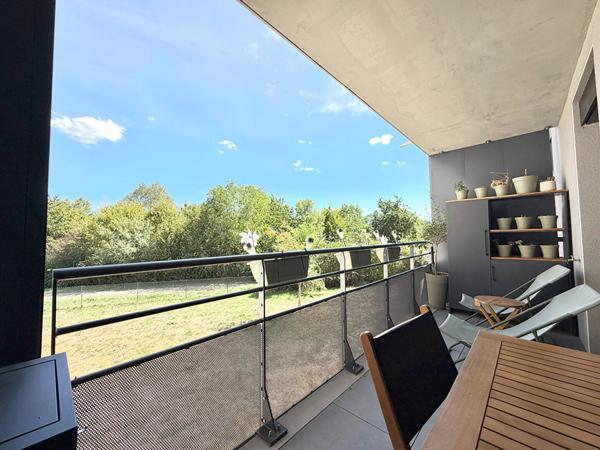 T2 ultra moderne de 54 m² avec grande terrasse, vue sur parc et parking couvert privatif