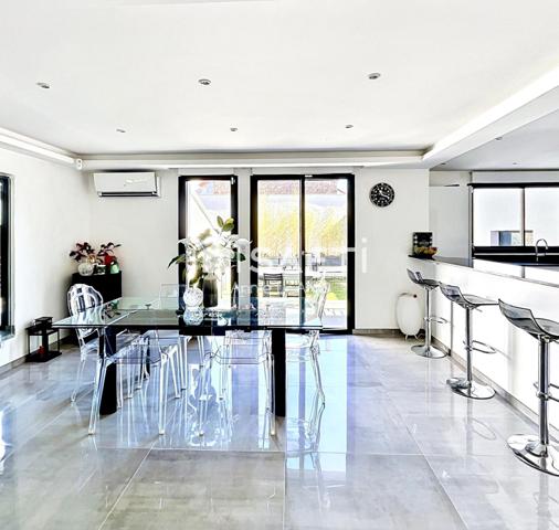 Maison contemporaine lumineuse et intelligente, au calme absolu en secteur recherché, avec prestations haut de gamme et excellent confort énergétique.