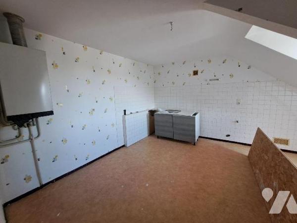 Appartement de 52 m² habitable, 70 m² au sol , situé au 3ème et dernier étage d'un immeuble de ...