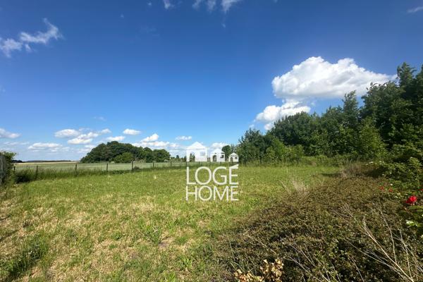 Ensemble immobilier pour cabinet medical / habitation comprenant une superbe maison individuelle en semi plain pied - 8 parkings + un terrain independant constructible de 996m²