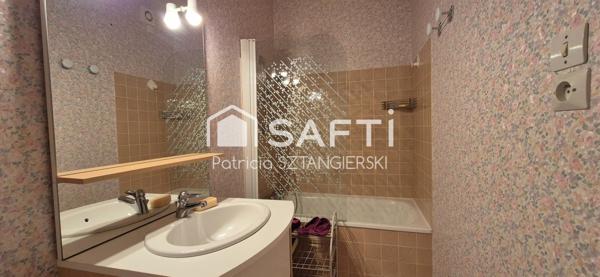 Très beau duplex de 104 m² avec terrasse, cave, place de parking dans résidence avec ascenseur