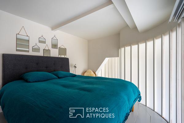 Loft de caractère dans un ancien showroom de porcelainier