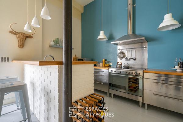 Loft de caractère dans un ancien showroom de porcelainier