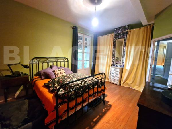 Maison de charme avec jardin intime, terrasse, balcon et SPA - centre-ville accessible à pied.