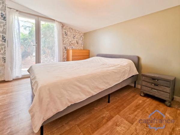 Appartement de 120m² avec 6 pièces - Terrasse et terrain privatif de 170m² - Parkings