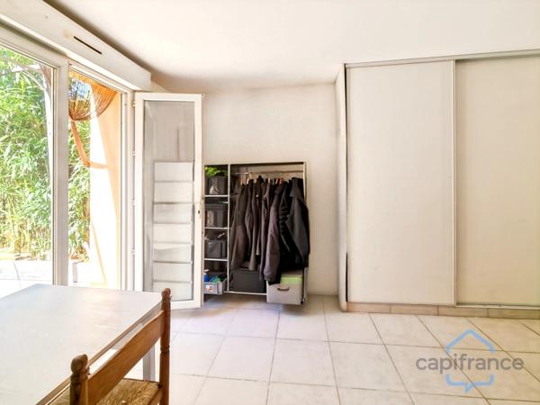 Appartement de 120m² avec 6 pièces - Terrasse et terrain privatif de 170m² - Parkings