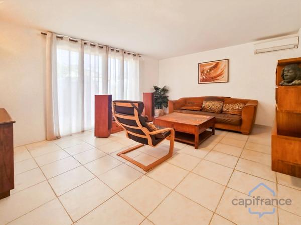 Appartement de 120m² avec 6 pièces - Terrasse et terrain privatif de 170m² - Parkings