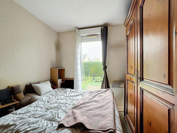 Charmant appartement en rez-de-jardin de 3 pièces avec 2 places de stationnement privatifs