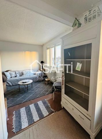 A SOISSONS CENTRE VILLE, APPARTEMENT F4 AVEC BALCON, CAVE ET GARAGE.