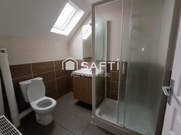 Maison 4 chambres dont une en rdc, 2 salles de bains, garage, terrain