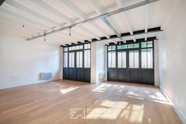 Loft en duplex avec jardin privatif en coeur de ville