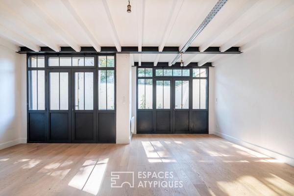 Loft en duplex avec jardin privatif en coeur de ville