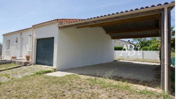 Maison + garage + auvent