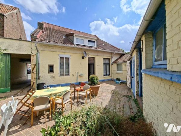 Maison, 5 chambres, garage et cour.