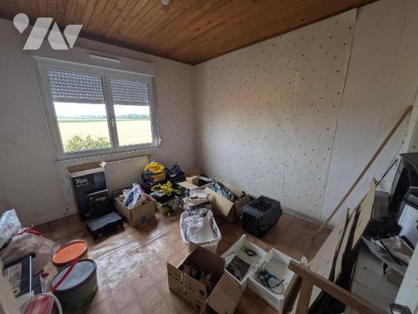 Idéal premier achat ou investissement locatif, maison avec petit jardin et garage, composée d'u...