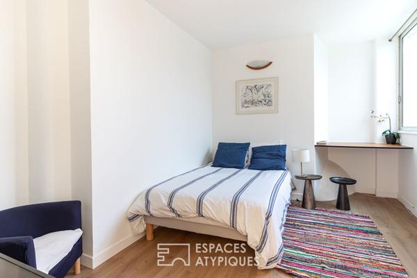 Loft dans un ancien atelier photo avec terrasses et piscine
