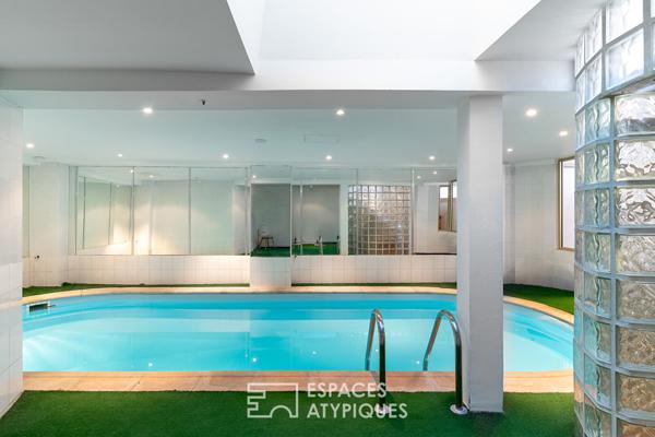 Loft dans un ancien atelier photo avec terrasses et piscine