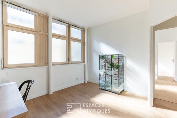 Loft dans un ancien atelier photo avec terrasses et piscine