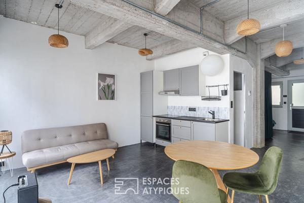 Petit loft style industriel et sa terrasse quartier Coop