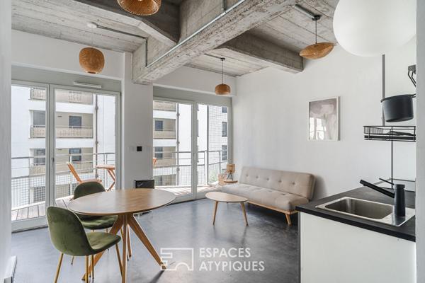Petit loft style industriel et sa terrasse quartier Coop