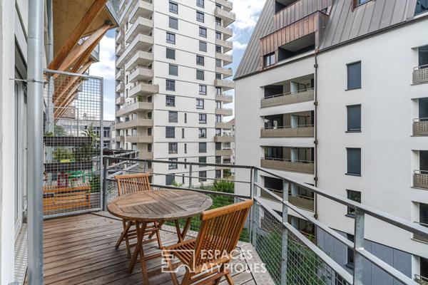 Petit loft style industriel et sa terrasse quartier Coop