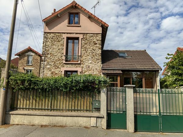 Jolie meulière 7 pièces