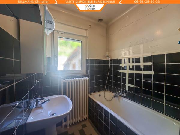 Maison jumelée d'un coté